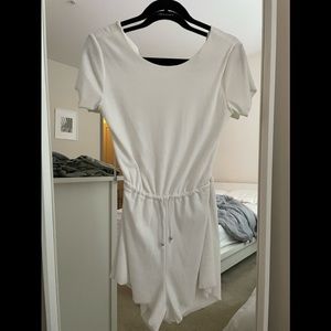 White romper with open back